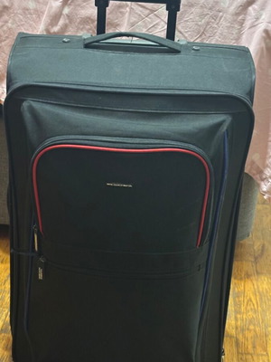 Benetton fabric black suitcase used with two wheels