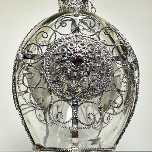 Vintage ornate handmade filigree glass bottle with red stones