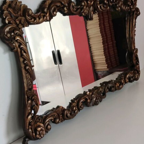 Very old carved wooden mirror like new