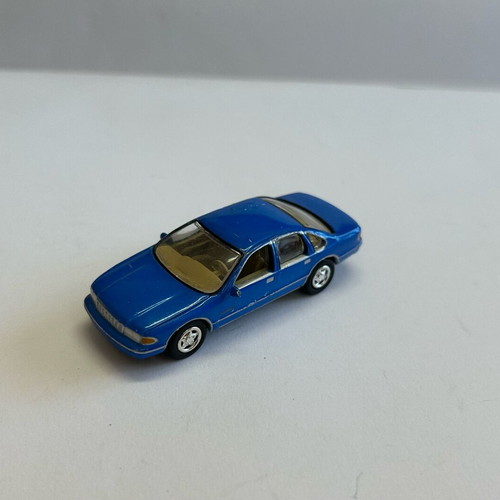 Johnny Lightning 1999 Chevy Caprice 1995 toy car used, very good condition