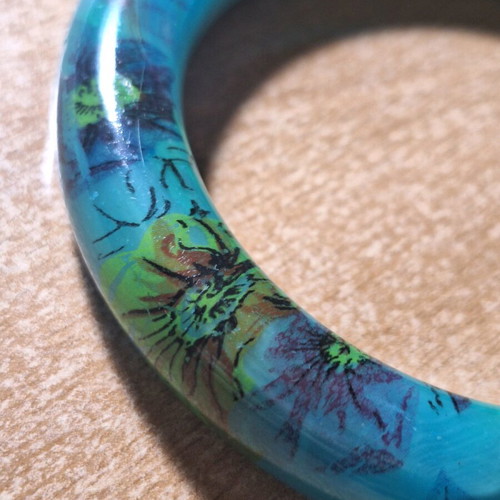 Petrol resin bracelet with flower designs like new