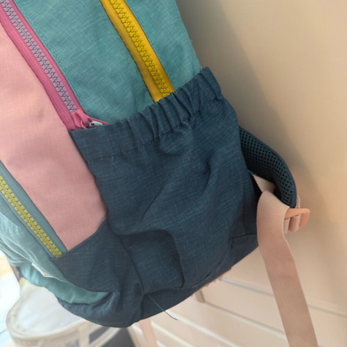Children's school backpack used with multiple compartments and supportive back