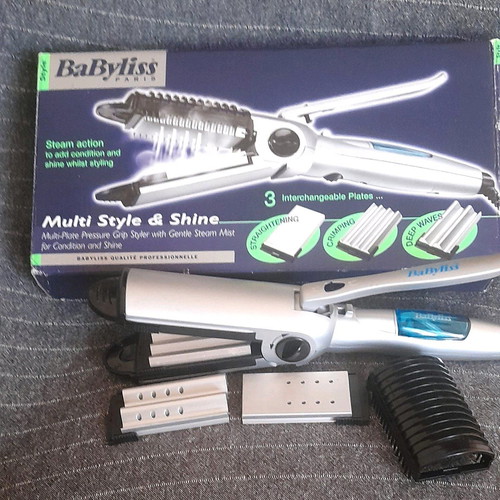 Babyliss hair straightener with three plates used and steam