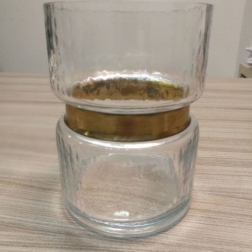 Decorative glass candle holder vase used with gold design