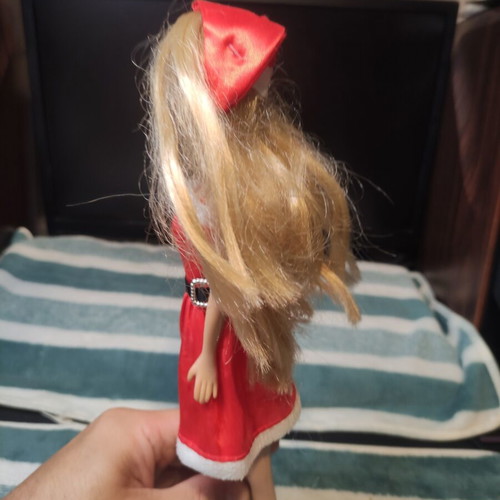 Doll dressed as Santa Claus used