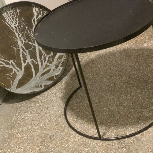 Decorative coffee table used with metal base and wooden top frame