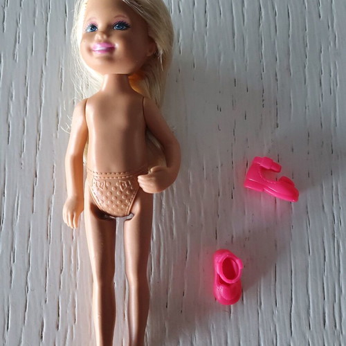 Barbie girl with her shoes used