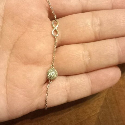 Silver bracelet with stones and infinity symbol like new