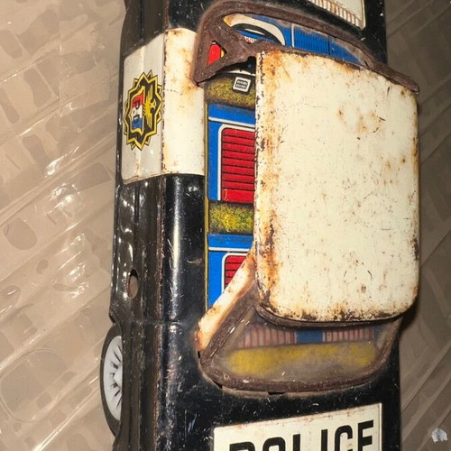 Tin car used with working wheels, rare