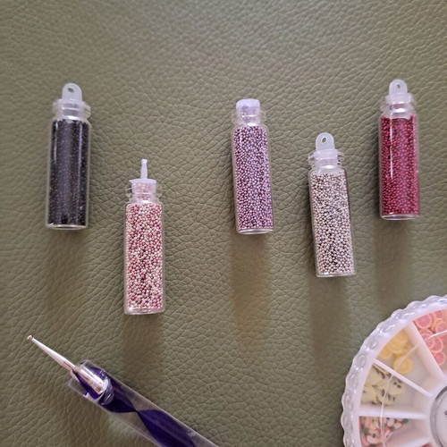 Nail decorations like new, assorted toppings