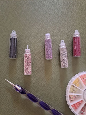 Nail decorations like new, assorted toppings