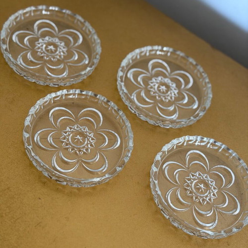 Set of 4 vintage glass coasters like new with embossed design