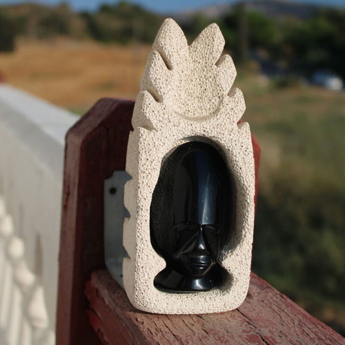 Obsidian African face sculpture