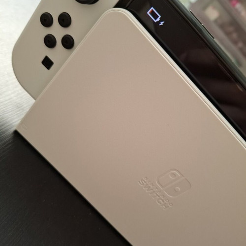 Nintendo Switch like new with original accessories and Super Mario Bros Wonder
