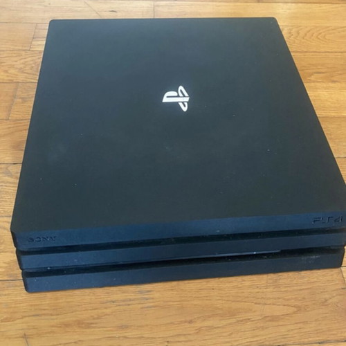 Sony PlayStation 4 Pro 1TB gaming bundle with controller and GTA V