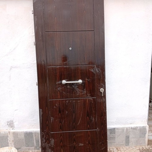 Entrance door used 2.15x0.94 solid wood with security lock