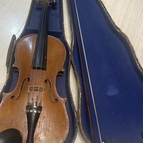 Old professional violin with bow