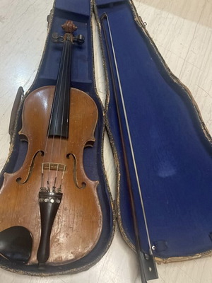 Old professional violin with bow