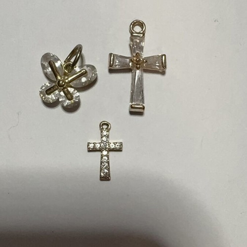 Cross pendants, gold color