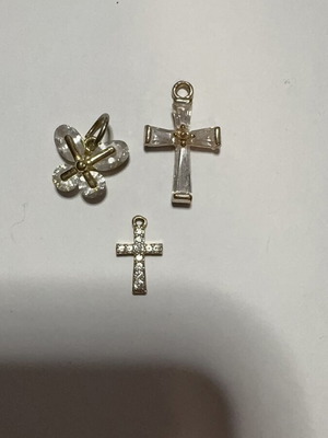 Cross pendants, gold color