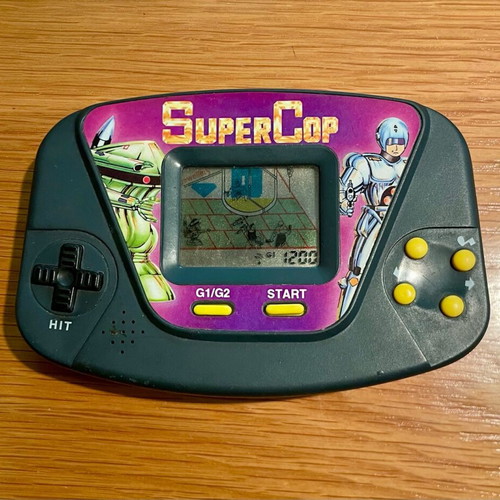 Super - Cop handheld electronic LCD game used, vintage 80s