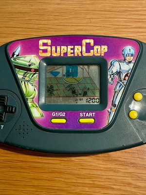Super - Cop handheld electronic LCD game used, vintage 80s