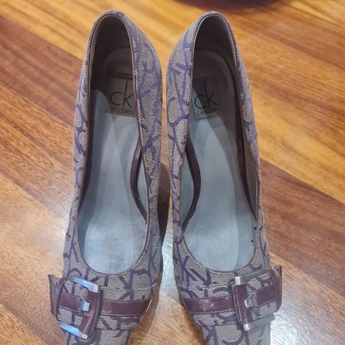 Calvin Klein burgundy high heels used with unique design