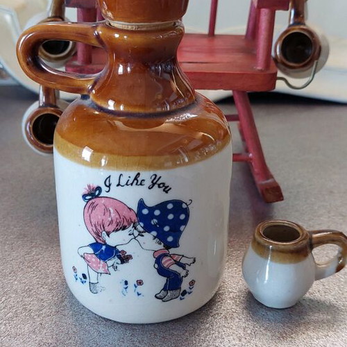 Decorative bottle with glasses like new