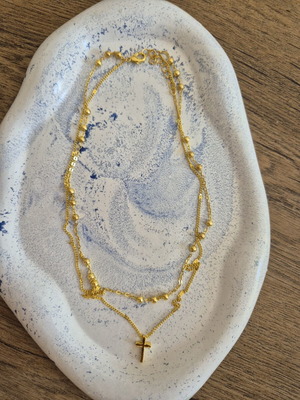 Gold double rosary-style necklace with cross, stainless steel