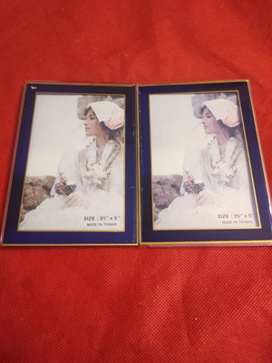 Double photo frame unused