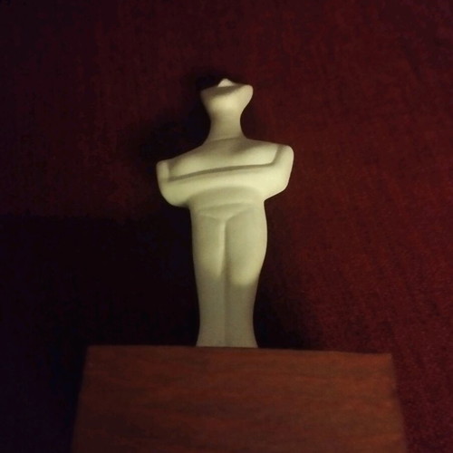Cycladic figurine used, museum replica of female figure