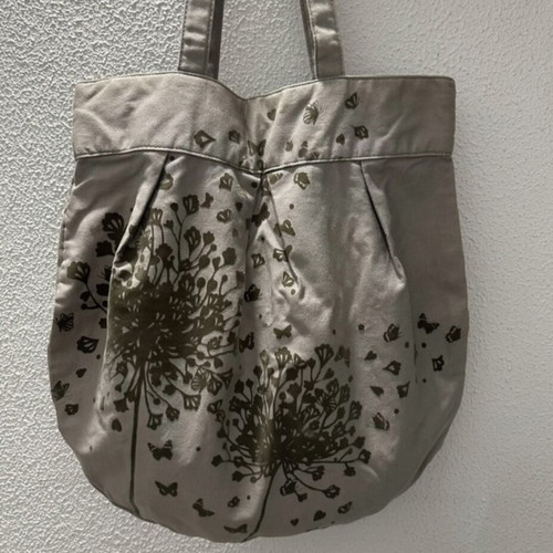 Accessorize shoulder bag like new, gray with butterfly design