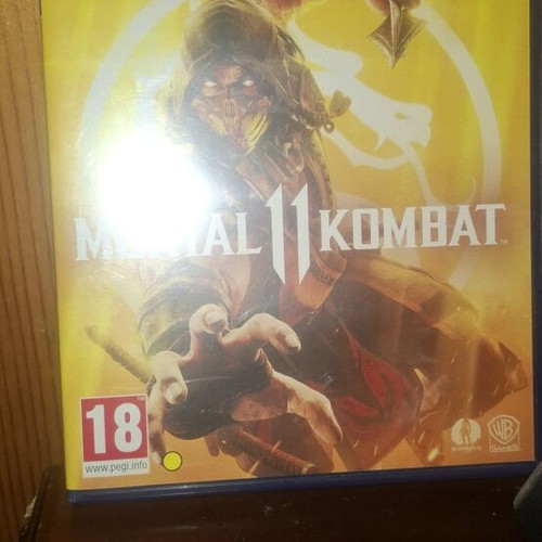 Playstation 4 Slim used with 500GB and Mortal Kombat 11