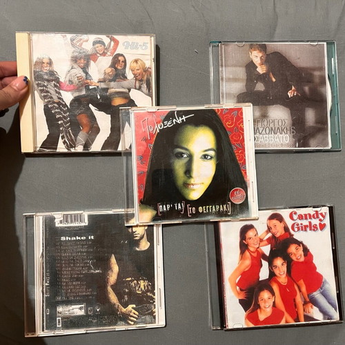 CDs used, pack of 35 with various music genres