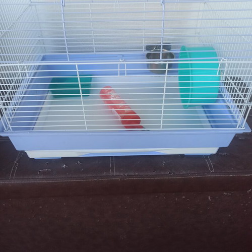 Hamster cage used, with cleaning drawer
