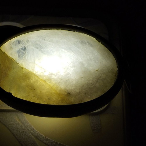 Metal necklace with oval moonstone semi-precious stone used