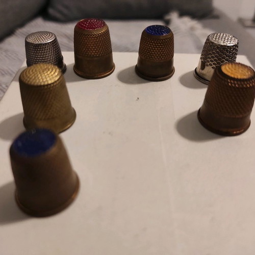 Lot of 7 vintage thimbles used