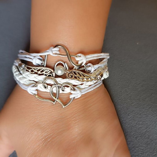 Love bracelet set new with white cords and charms