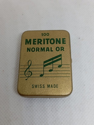 Vintage metal box with Meritone Swiss phonograph needles used
