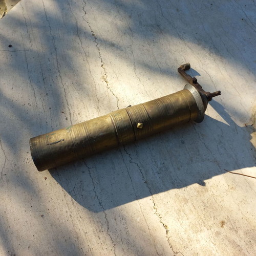 Old brass coffee-pepper grinder used