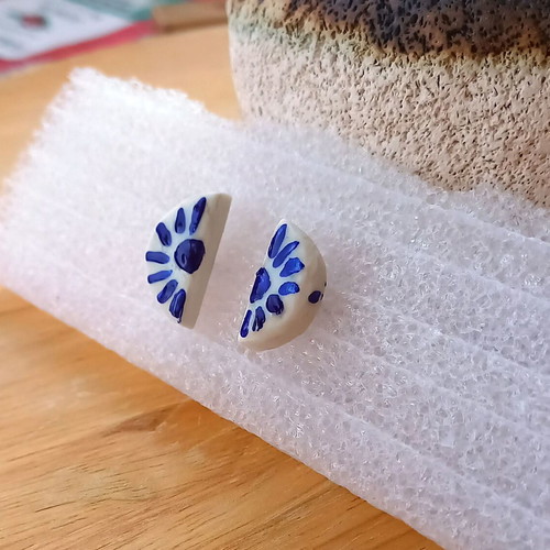 Handmade ceramic earrings with hand-painted designs and glass coating