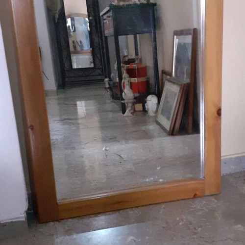 Solid wood mirror with curved wooden frame