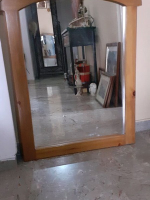 Solid wood mirror with curved wooden frame