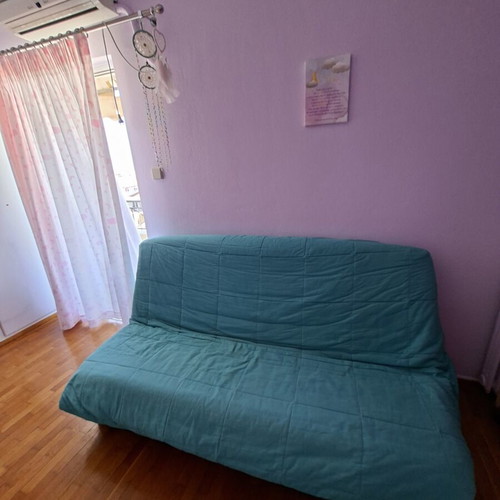 Sofa bed like new, 1.80×0.85 m, green fabric with storage and pillows