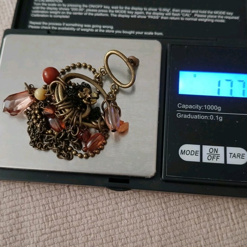 Ethnic handmade single earring like new with long chains and stones