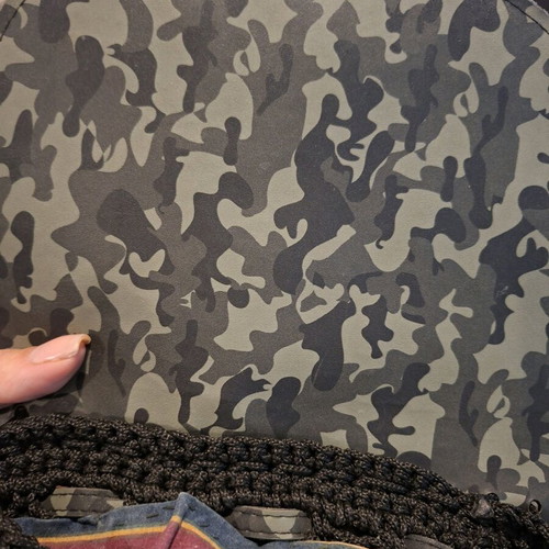 Knitted backpack like new with camo flap