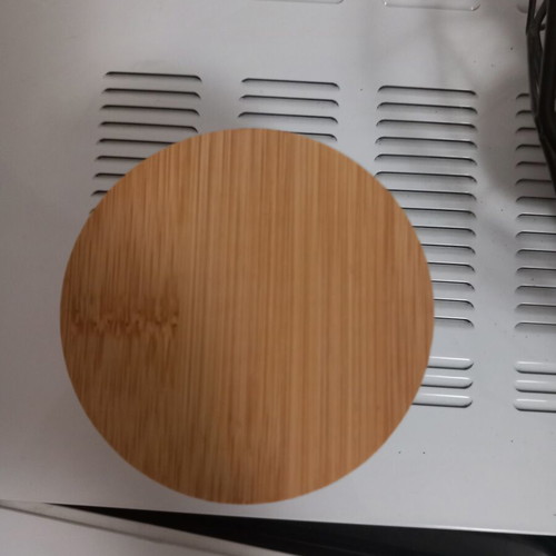 Candle container with wooden lid