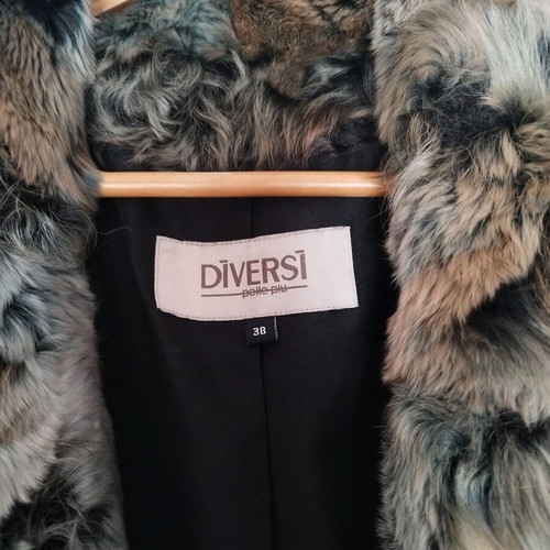 Diversi natural fur size 38 like new