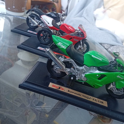 Collectible Motorcycle Miniatures like new with display bases