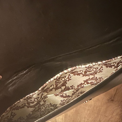 Black clutch bag with gray leopard pattern like new